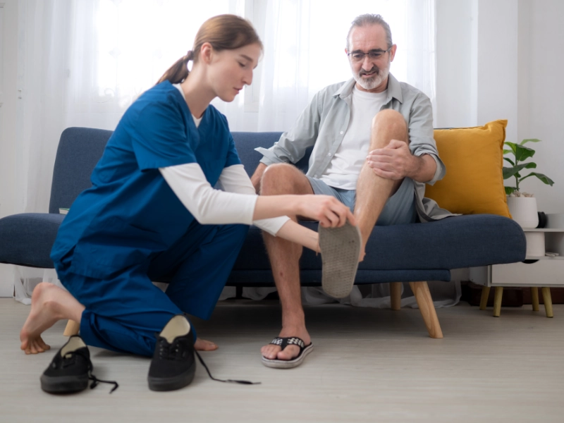 A nurse treating a patient